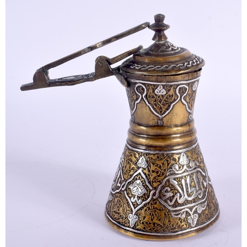 337 - A RARE 19TH CENTURY MIDDLE EASTERN SILVER INLAID CHOCOLATE POT decorated with calligraphy. 15 cm x 1... 