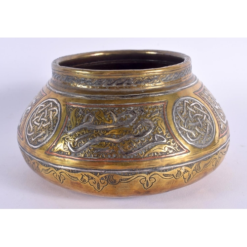 345 - A 19TH CENTURY MIDDLE EASTERN ISLAMIC SILVER INLAID CENSER decorated with scripture and motifs. 14 c... 