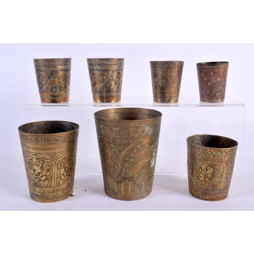 347 - SEVEN 19TH CENTURY INDIAN BRONZE BEAKERS. Largest 9.5 cm high. (7)