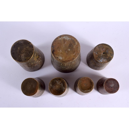 347 - SEVEN 19TH CENTURY INDIAN BRONZE BEAKERS. Largest 9.5 cm high. (7)