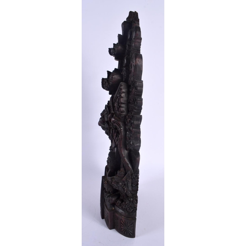 356 - A LARGE EARLY 20TH CENTURY BALINESE CARVED WOOD TEMPLE FIGURE depicting buddhistic deities in variou... 