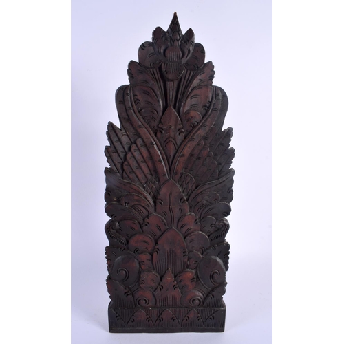 356 - A LARGE EARLY 20TH CENTURY BALINESE CARVED WOOD TEMPLE FIGURE depicting buddhistic deities in variou... 