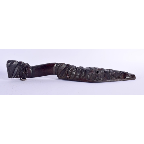 369 - AN UNUSUAL EARLY 20TH CENTURY MAORI TRIBAL NEW ZEALAND CARVED WOOD CLUB possibly a Wahaiki, with fla... 