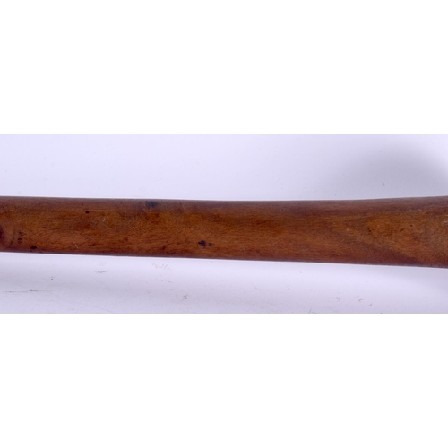 370 - AN EARLY 20TH CENTURY TRIBAL CARVED WOOD THROWING CLUB with dimpled terminal. 47 cm long.