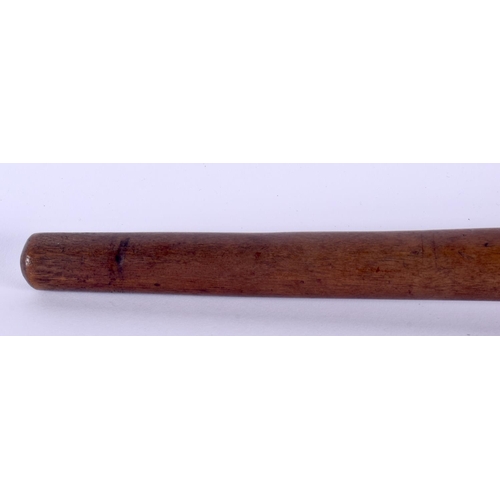 370 - AN EARLY 20TH CENTURY TRIBAL CARVED WOOD THROWING CLUB with dimpled terminal. 47 cm long.