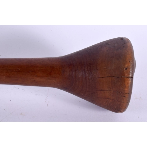 370 - AN EARLY 20TH CENTURY TRIBAL CARVED WOOD THROWING CLUB with dimpled terminal. 47 cm long.