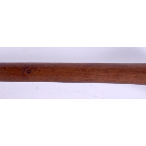 370 - AN EARLY 20TH CENTURY TRIBAL CARVED WOOD THROWING CLUB with dimpled terminal. 47 cm long.