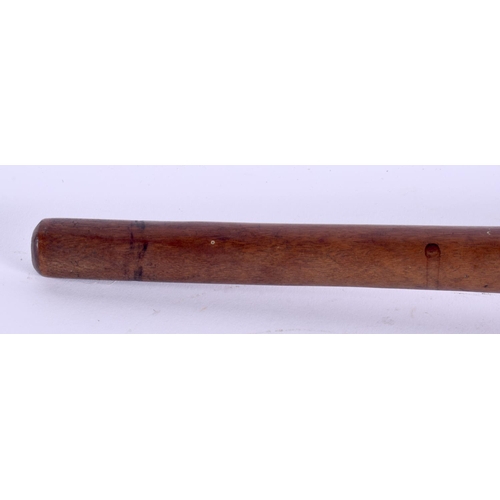 370 - AN EARLY 20TH CENTURY TRIBAL CARVED WOOD THROWING CLUB with dimpled terminal. 47 cm long.