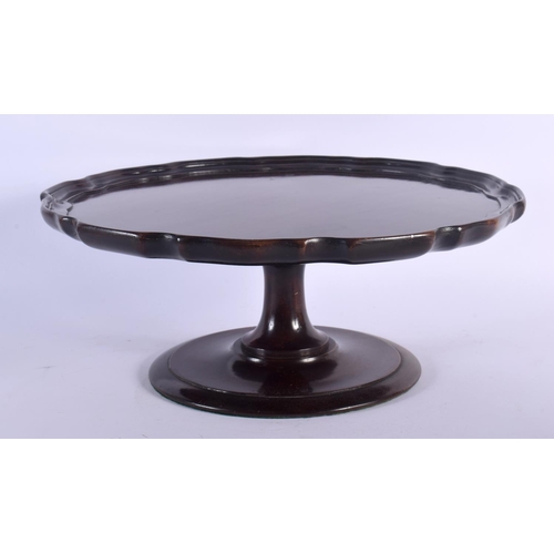 373 - AN EDWARDIAN MAHOGANY LAZY SUSAN. 35 cm wide.