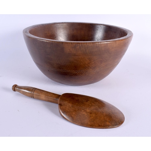 374 - A CHARMING TREEN CARVED WOOD BUTTER PAT with spoon. Bowl 22 cm wide. (2)