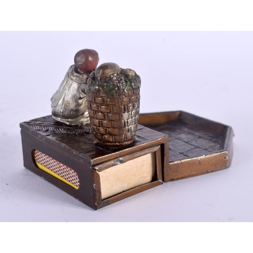 381 - AN EARLY 20TH CENTURY AUSTRIAN COLD PAINTED SPELTER ASHTRAY with matchbox holder. 10 cm x 5 cm.