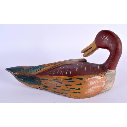 382 - A VINTAGE CARVED AND PAINTED FOLK ART DECOY DUCK. 34 cm x 12 cm.