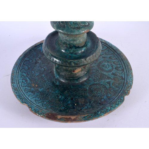 403 - A LARGE 17TH/18TH CENTURY PERSIAN TURQUOISE GLAZED OIL LAMP engraved with foliage and motifs. 38 cm ... 