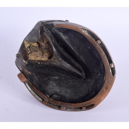 407 - A VICTORIAN EQUESTRIAN COPPER MOUNTED HORSE HOOF INKWELL. 15 cm x 10 cm.