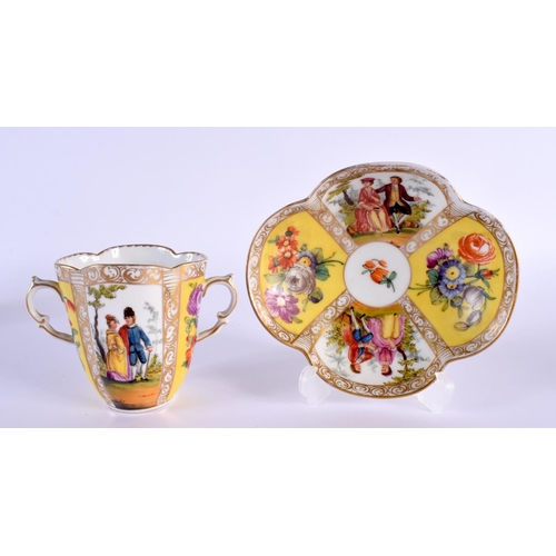 42 - A DRESDEN AUGUSTUS REX PORCELAIN QUATREFOIL CHOCOLATE CUP AND SAUCER. 13 cm wide. (2)