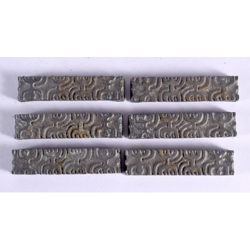 421 - A RARE SET OF TRIBAL MARQUISE ISLANDS PRINTING BLOCKS. 13.5 cm wide overall.