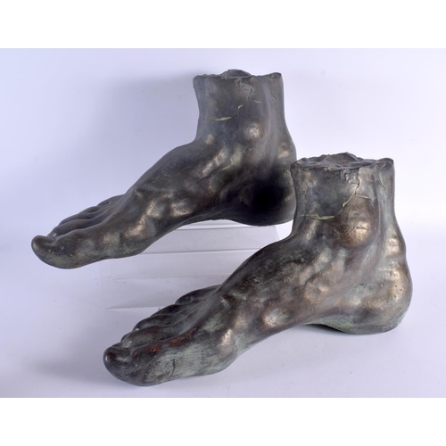 438 - AN UNUSUAL PAIR OF BRONZED COUNTRY HOUSE ROMAN FOOT DOOR STOPS After the Antiquity. 52 cm x 28 cm.