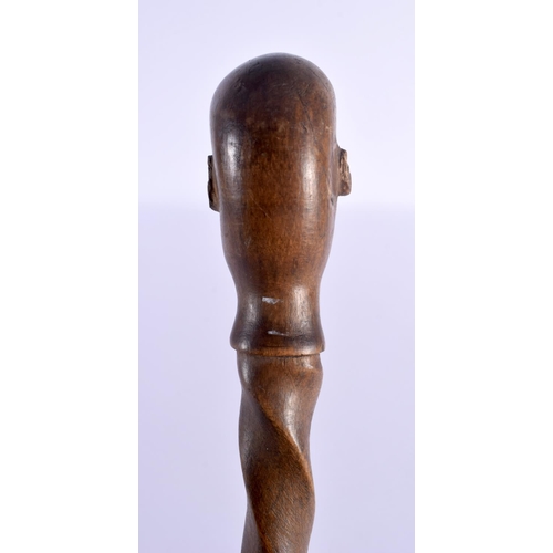 447 - AN 18TH/19TH CENTURY EUROPEAN CARVED FOLK ART WOOD WALKING CANE with spiral twist shaft. 86 cm long.