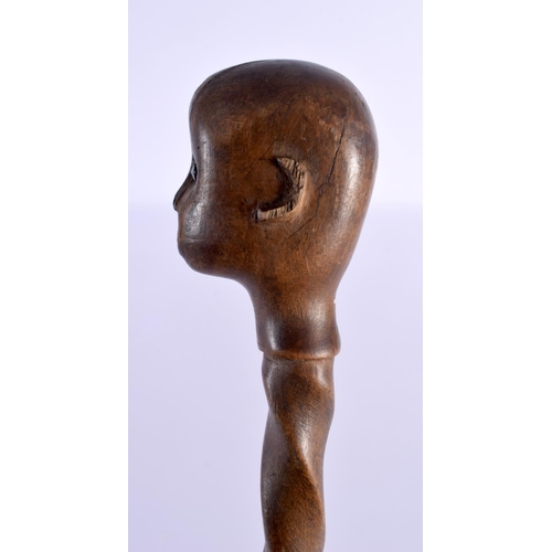 447 - AN 18TH/19TH CENTURY EUROPEAN CARVED FOLK ART WOOD WALKING CANE with spiral twist shaft. 86 cm long.