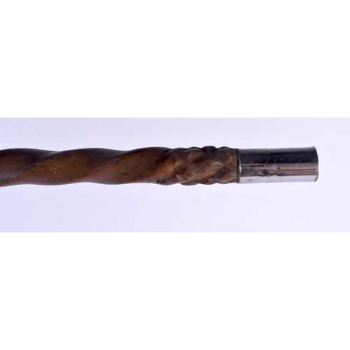 447 - AN 18TH/19TH CENTURY EUROPEAN CARVED FOLK ART WOOD WALKING CANE with spiral twist shaft. 86 cm long.