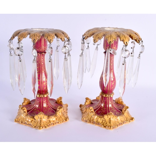 453 - A PAIR OF 19TH CENTURY EUROPEAN COUNTRY HOUSE PORCELAIN LUSTRE CANDLESTICKS. 20 cm x 10 cm.