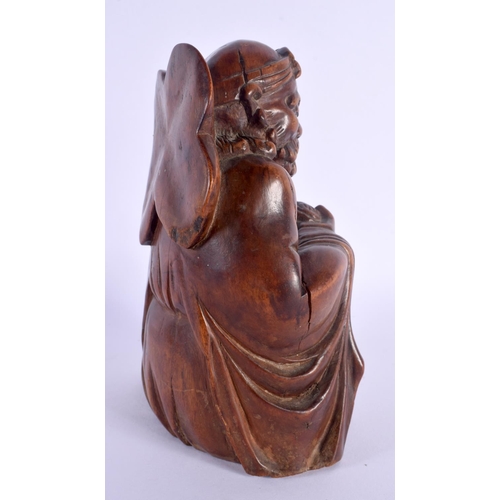 457 - A LATE 18TH/19TH CENTURY CHINESE CARVED HARDWOOD FIGURE OF A SCHOLAR Qianlong/Jiaqing. 20 cm high.