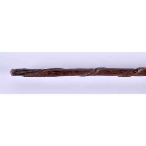 462 - A VINTAGE FOLK ART CARVED WOOD CANE. 78 cm long.