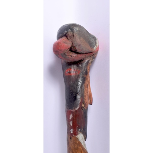 466 - A RARE ANTIQUE FOLK ART DOUBLE HEAD WALKING CANE. 86 cm long.