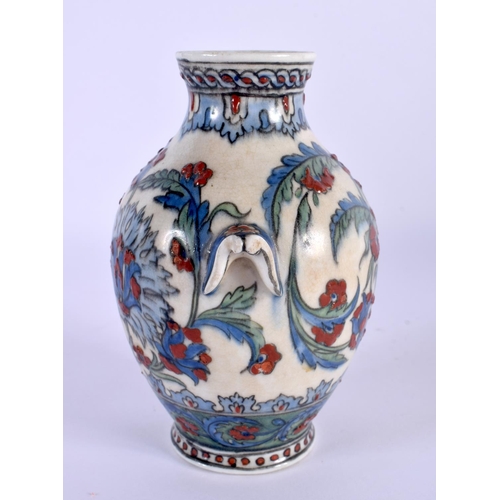 469 - A FINE 19TH CENTURY MIDDLE EASTERN OTTOMAN FAIENCE PORCELAIN VASE painted with flowers. 13 cm high.