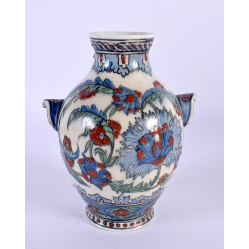 469 - A FINE 19TH CENTURY MIDDLE EASTERN OTTOMAN FAIENCE PORCELAIN VASE painted with flowers. 13 cm high.