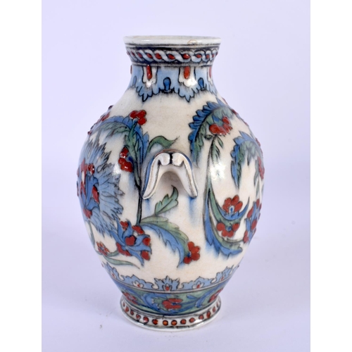 469 - A FINE 19TH CENTURY MIDDLE EASTERN OTTOMAN FAIENCE PORCELAIN VASE painted with flowers. 13 cm high.