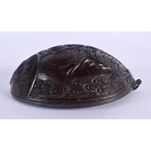 481 - AN 18TH CENTURY CONTINENTAL CARVED COCONUT CUP BUG BEAR with silver mounts. 13 cm x 8 cm.