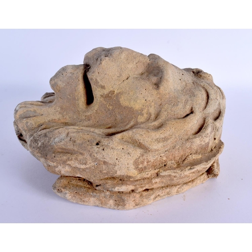 493 - A 16TH/17TH CENTURY EUROPEAN CARVED STONE LION HEAD ROUNDEL. 22 cm x 22 cm.