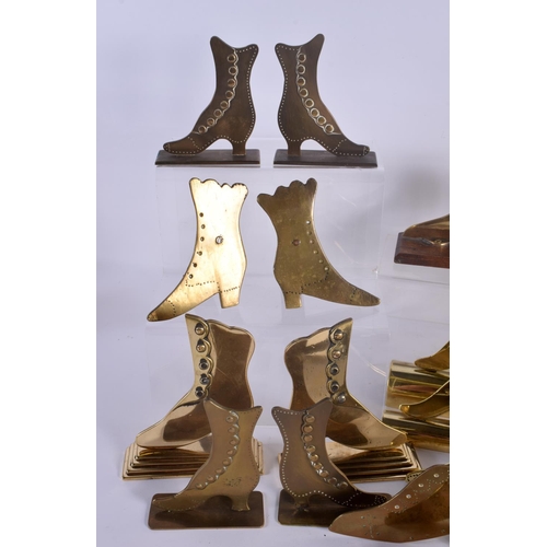 509 - A COLLECTION OF VINTAGE FOLK ART BRASS SHOP DISPLAY SHOES. Largest 12 cm x 18 cm. (qty)|