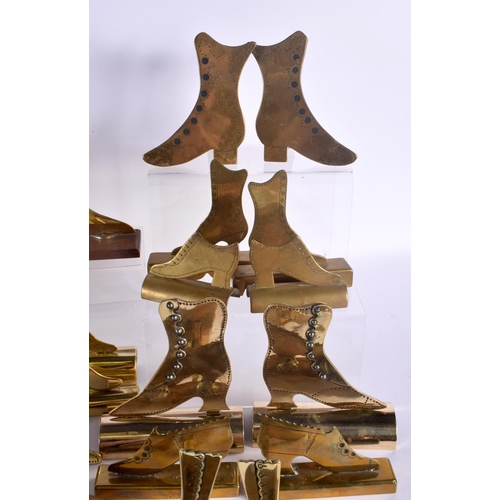 509 - A COLLECTION OF VINTAGE FOLK ART BRASS SHOP DISPLAY SHOES. Largest 12 cm x 18 cm. (qty)|