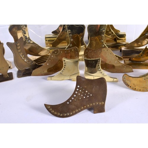 509 - A COLLECTION OF VINTAGE FOLK ART BRASS SHOP DISPLAY SHOES. Largest 12 cm x 18 cm. (qty)|