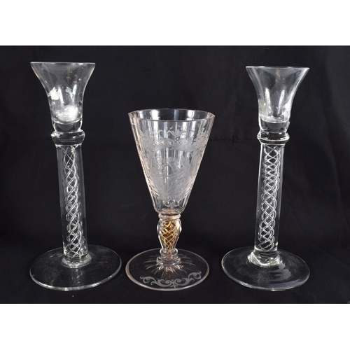 51 - A FINE EUROPEAN ENGRAVED GLASS CAMEO WINE GLASS together with two others. Largest 21 cm high. (3)