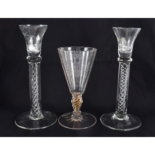 51 - A FINE EUROPEAN ENGRAVED GLASS CAMEO WINE GLASS together with two others. Largest 21 cm high. (3)