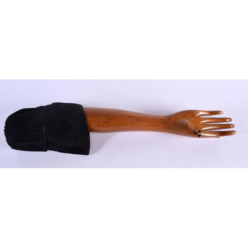 512 - A CHARMING VINTAGE ARTICULATED WOODEN DUMMY HAND possibly for jewellery display. 53 cm long.