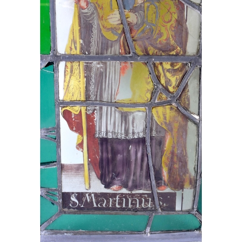 513 - A PAIR OF ANTIQUE STAINED GLASS WINDOWS. 42 cm x 30 cm.