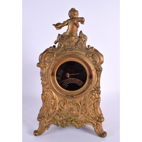 520 - AN EARLY 20TH CENTURY CONTINENTAL GILT METAL MANTEL CLOCK. 32 cm x 12 cm.