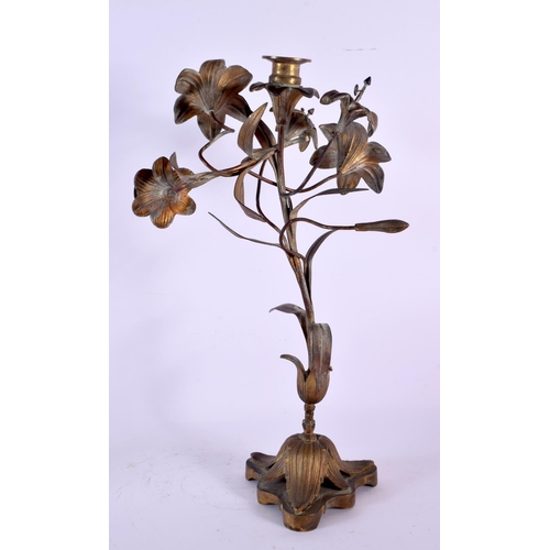 525 - AN ART NOUVEAU FRENCH BRONZE CANDLESTICK of naturalistic form. 40 cm high.