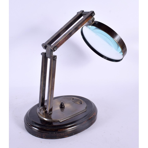 545 - A CONTEMPORARY MAGNIFYING GLASS. 44 cm high.