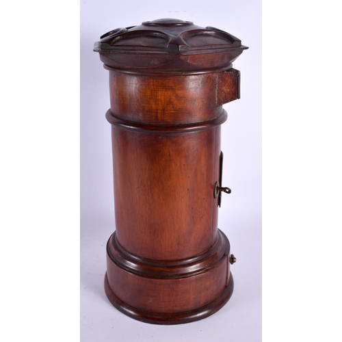 546 - A LARGE CONTEMPORARY CARVED WOOD POST BOX. 40 cm high.