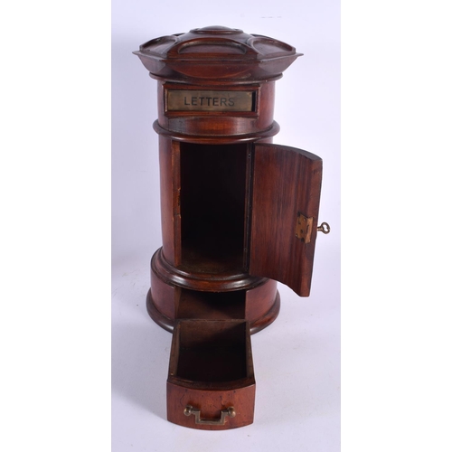 546 - A LARGE CONTEMPORARY CARVED WOOD POST BOX. 40 cm high.