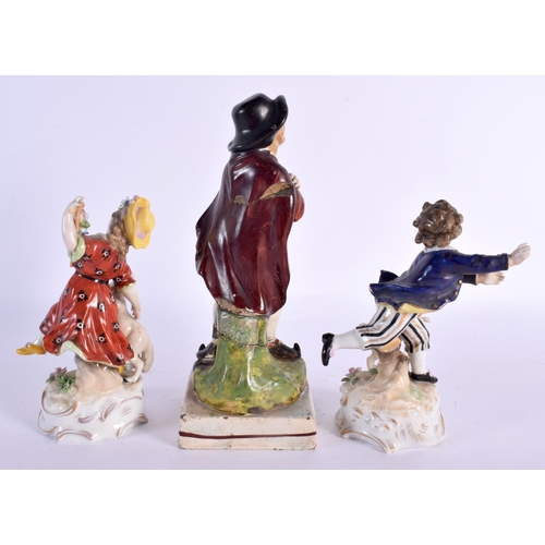 55 - AN 18TH/19TH CENTURY STAFFORDSHIRE FIGURE and a pair of small Continental porcelain figures. Largest... 