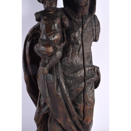 556 - A LARGE ANTIQUE CARVED EUROPEAN CARVED WOOD FIGURE OF A SAINT. 45 cm x 8 cm.