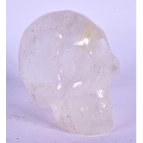 570 - A CONTEMPORARY ROCK CRYSTAL SKULL. 8 cm x 8 cm.