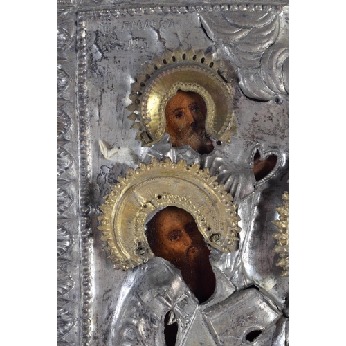 579 - AN ANTIQUE RUSSIAN ICON. 30 cm x 28 cm.