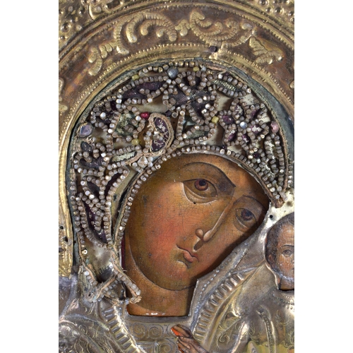 580 - AN ANTIQUE RUSSIAN ICON. 30 cm x 28 cm.